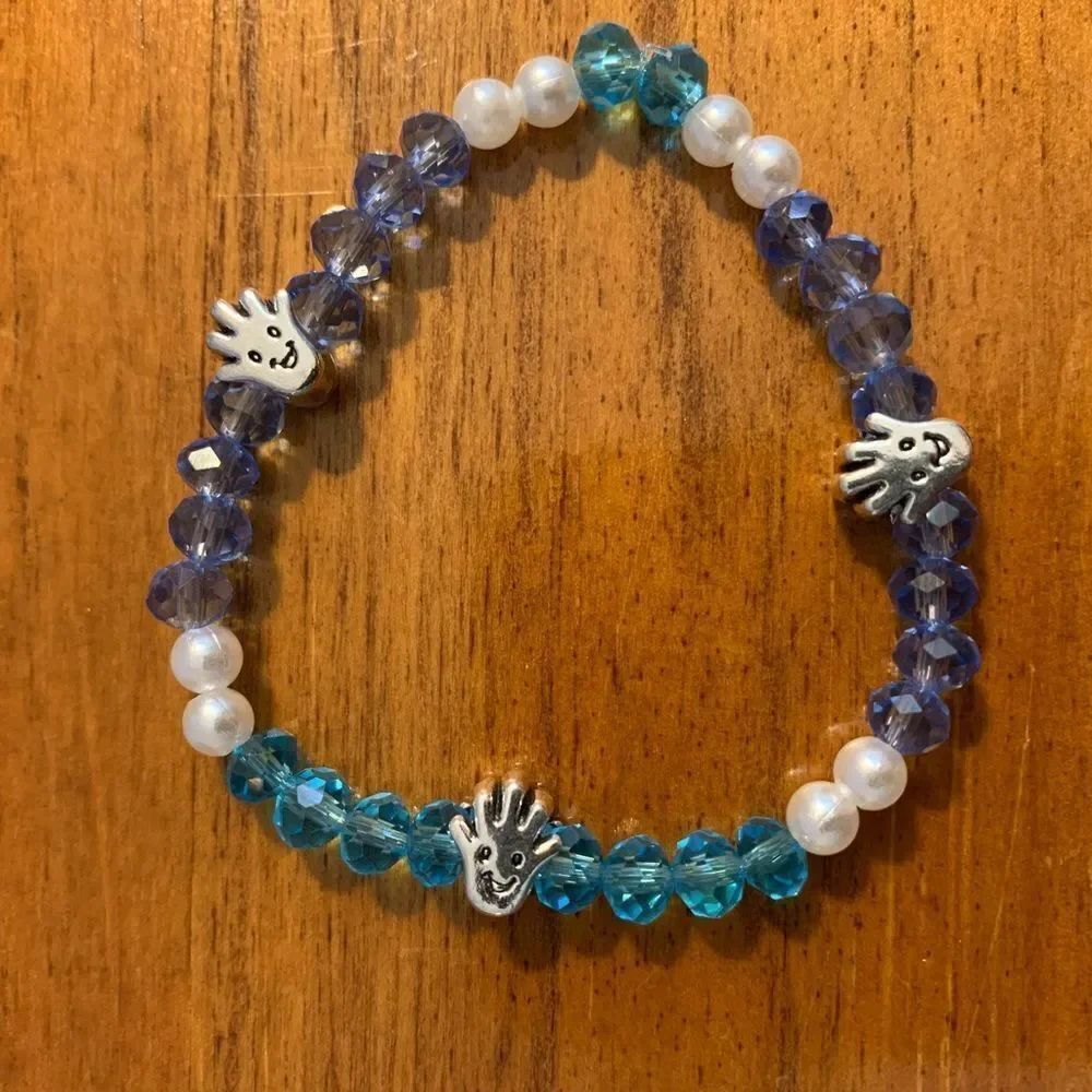 Handmade blue beaded stretch bracelet happy hands